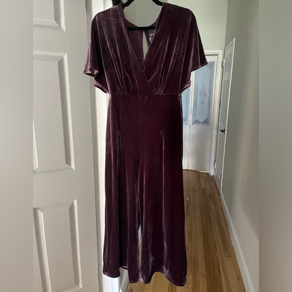 velvet jumpsuit from Anthropologie. Never worn, color is a muted gem tone purple